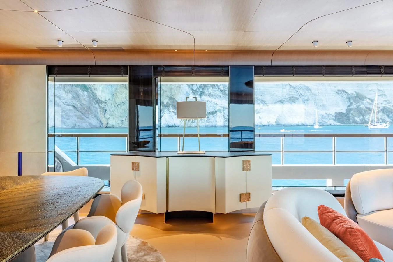 a room with a table and chairs aboard CLUB M Yacht for Sale