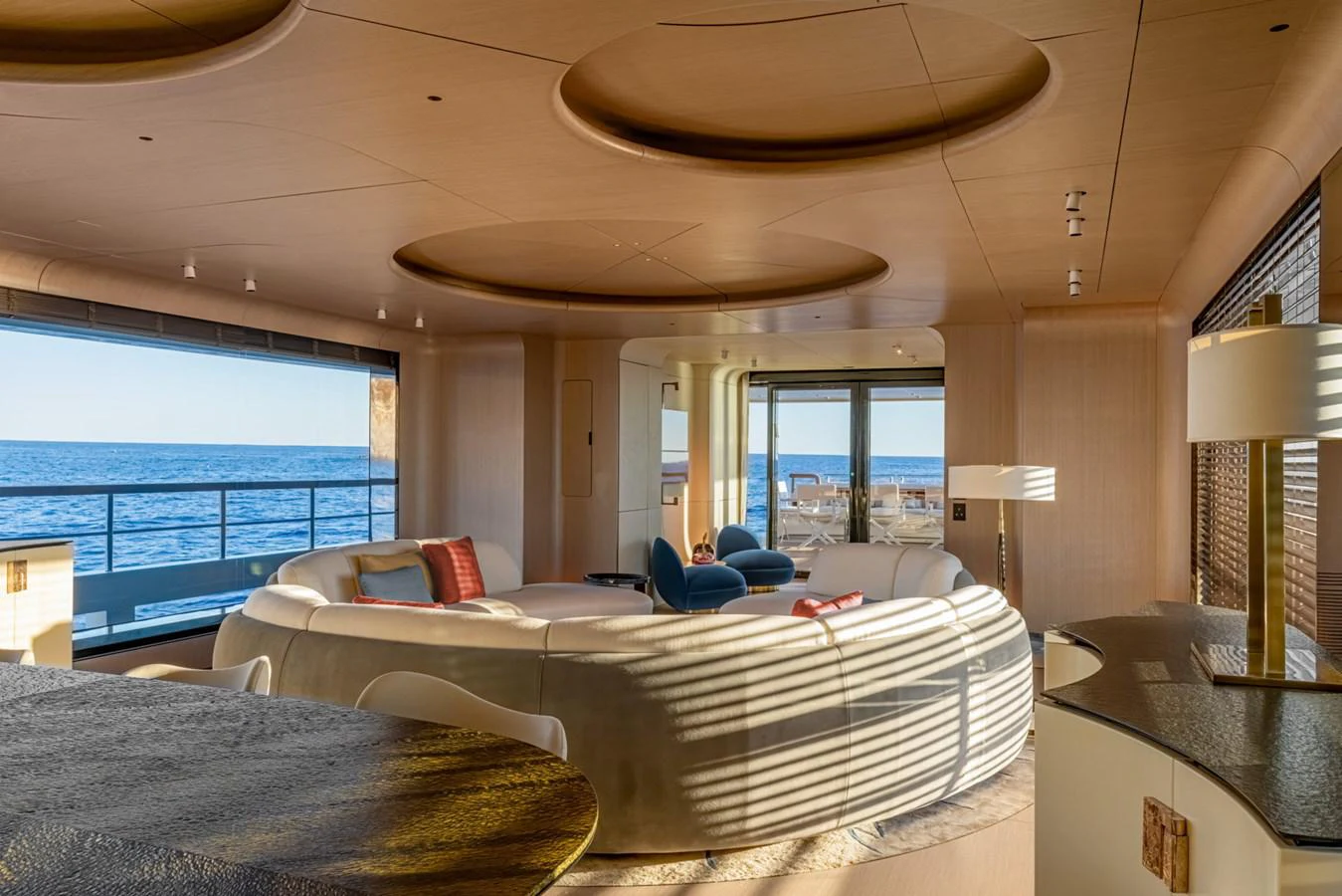 a large living room with a large balcony aboard CLUB M Yacht for Sale