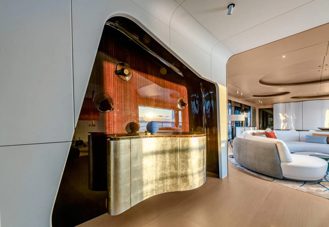 a room with a couch and a table aboard CLUB M Yacht for Sale