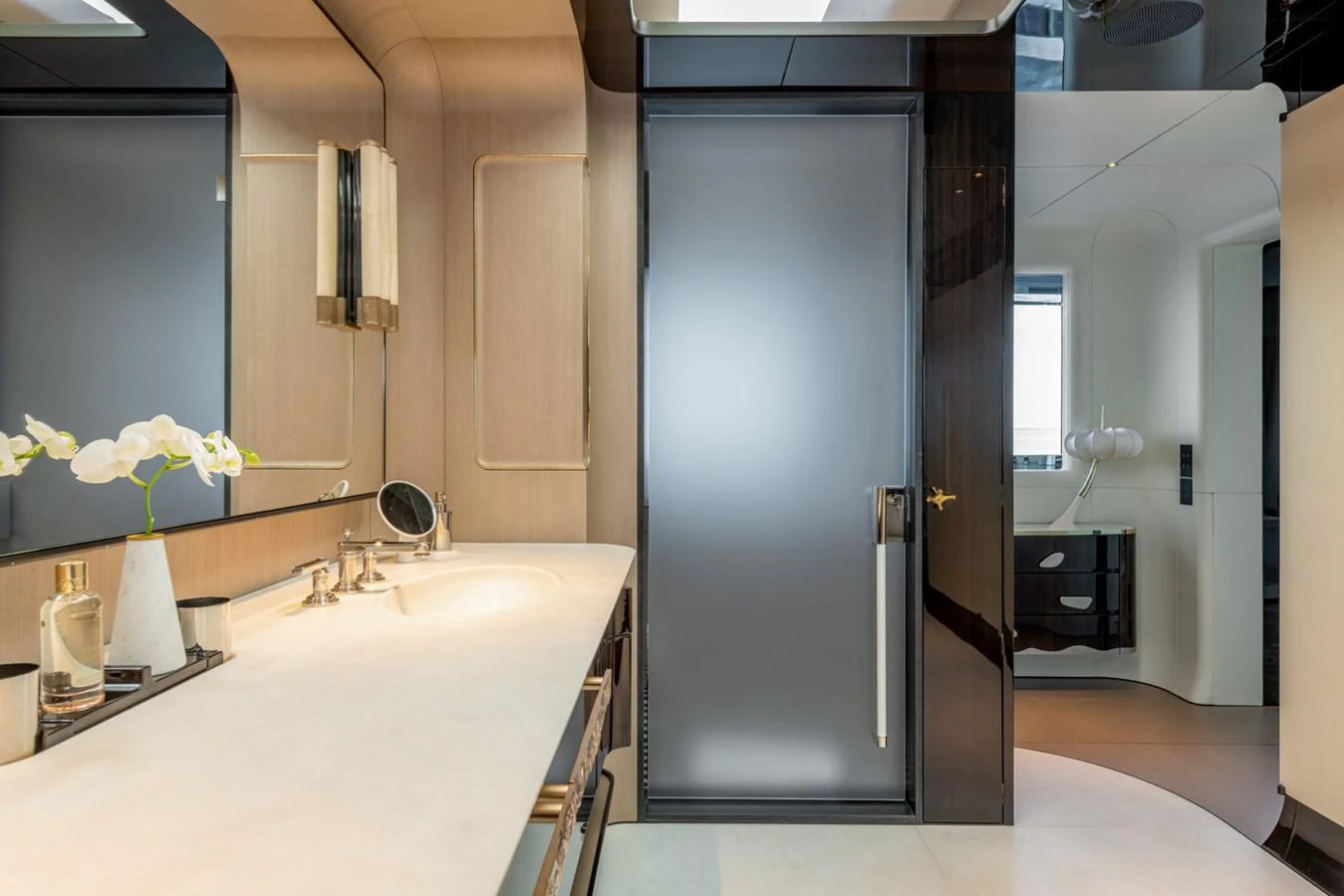 a bathroom with a sink and a shower aboard CLUB M Yacht for Sale