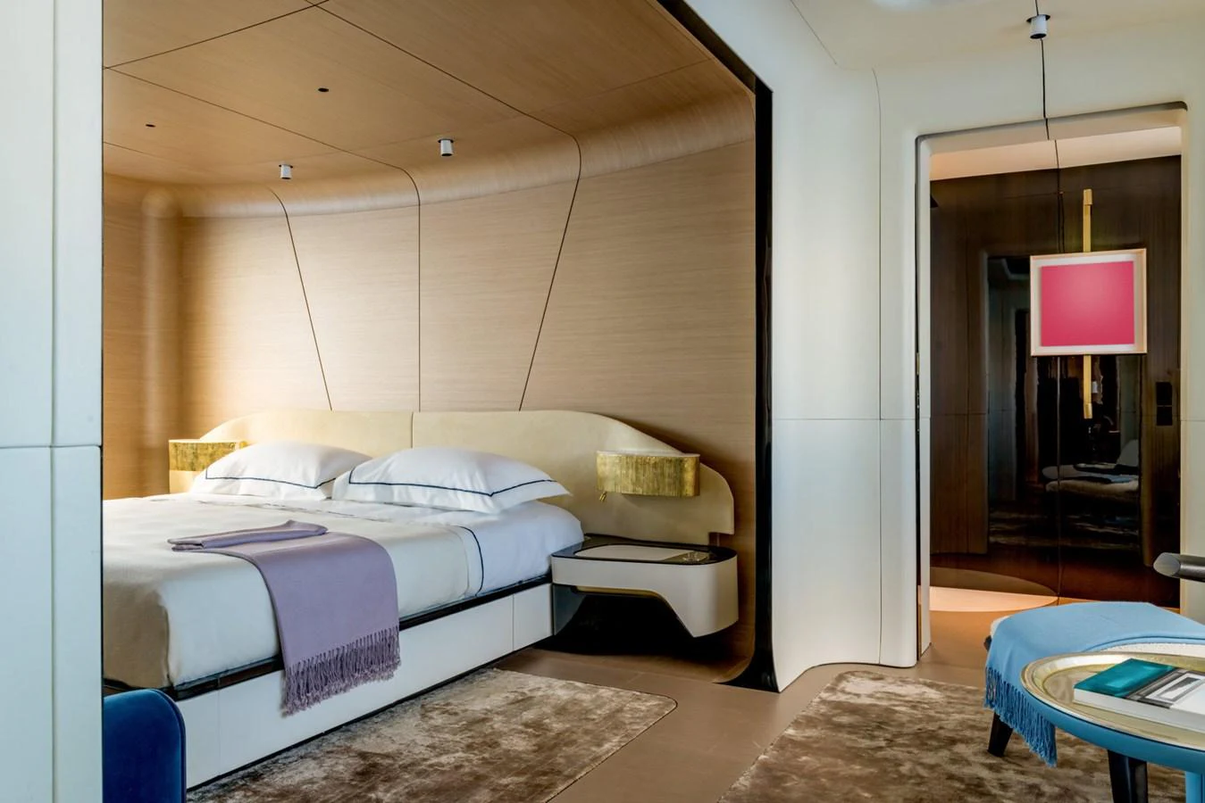 a bedroom with two beds aboard CLUB M Yacht for Sale