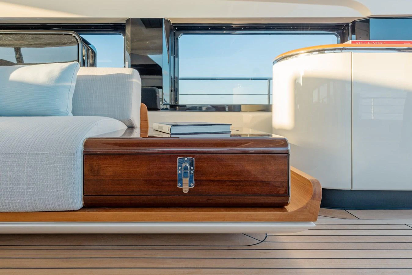 a suitcase on a shelf aboard CLUB M Yacht for Sale