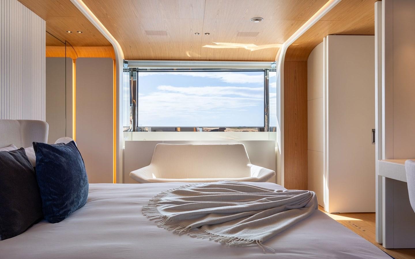 a bed in a room aboard EH2 Yacht for Sale