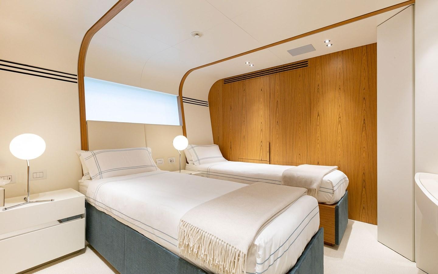 a room with two beds aboard EH2 Yacht for Sale