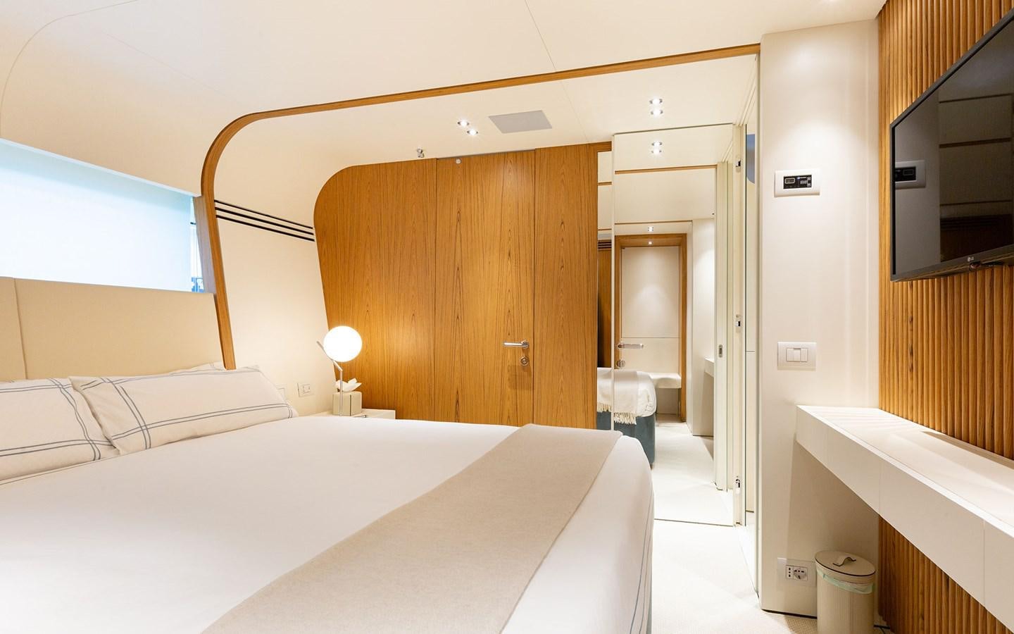 a hotel room with a bed aboard EH2 Yacht for Sale