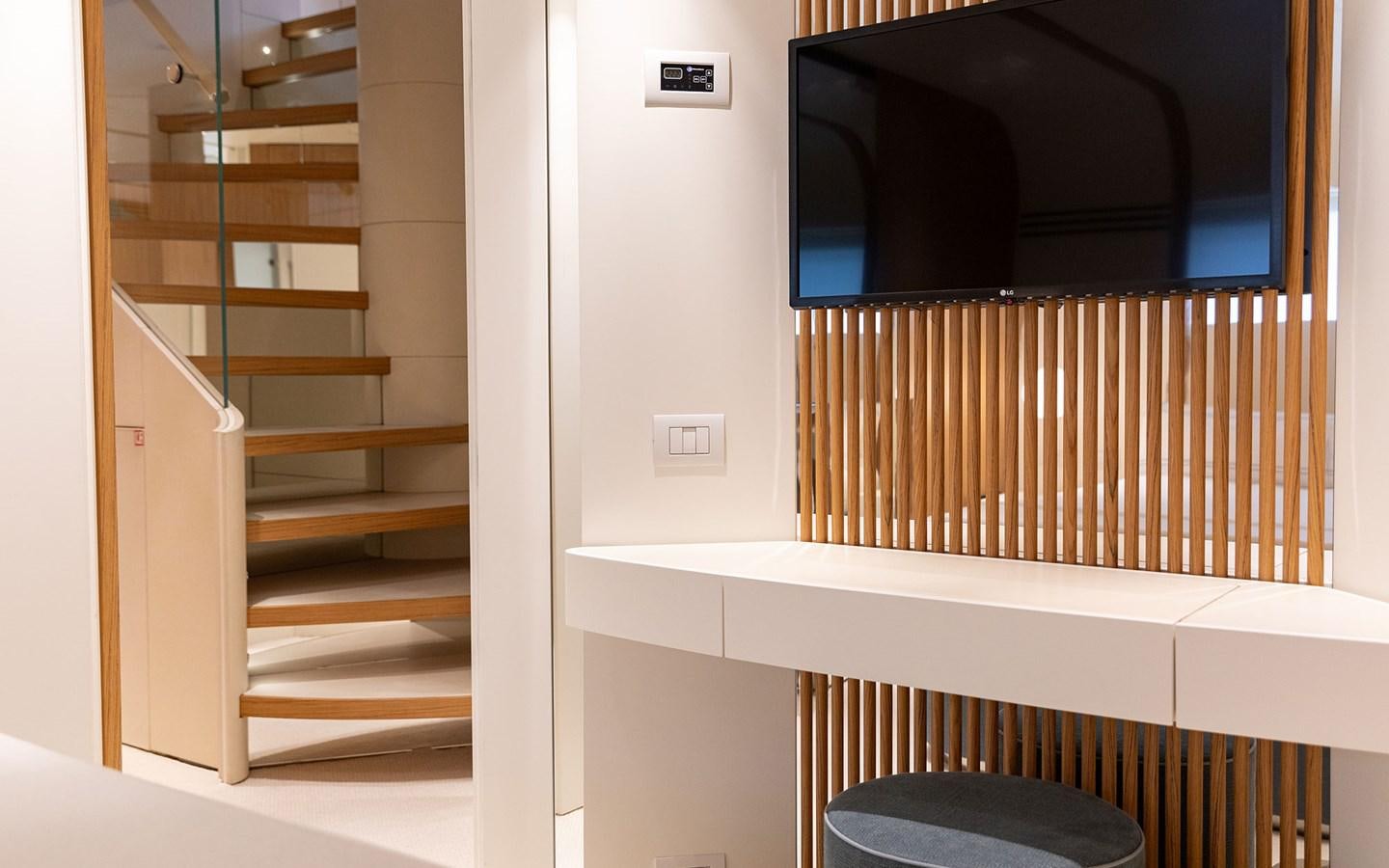 a white shelf with a black object on it aboard EH2 Yacht for Sale