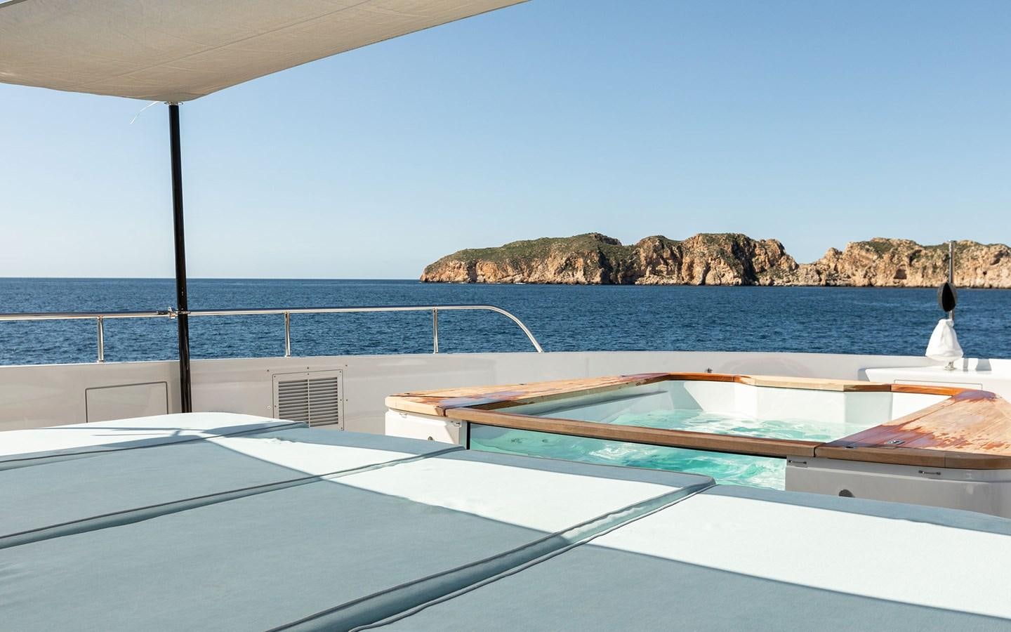 a pool on a deck aboard EH2 Yacht for Sale