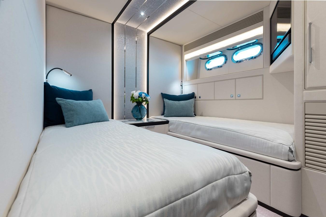 a room with two beds aboard E90 MOTOR Yacht for Sale