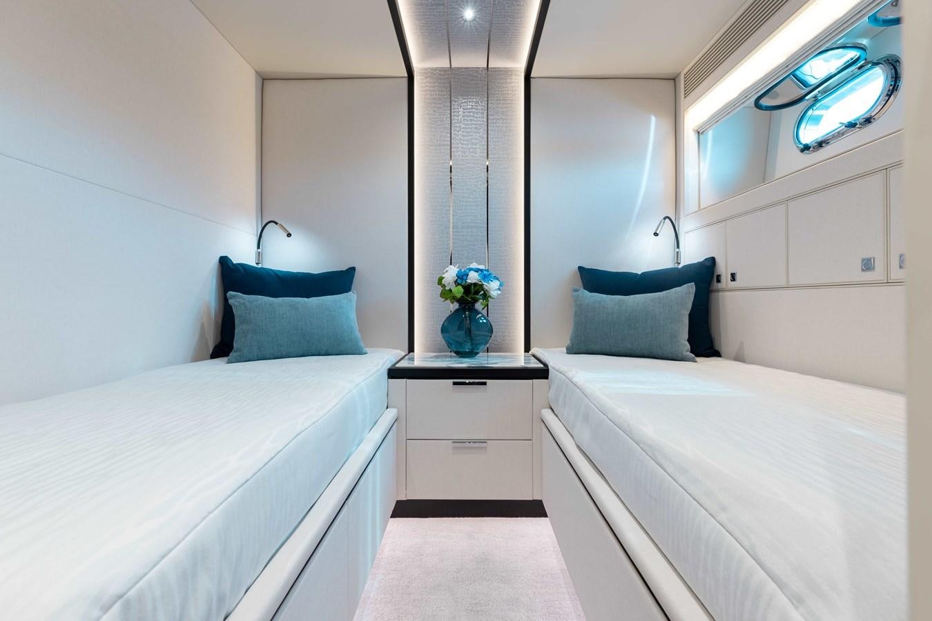 a room with two beds aboard E90 MOTOR Yacht for Sale