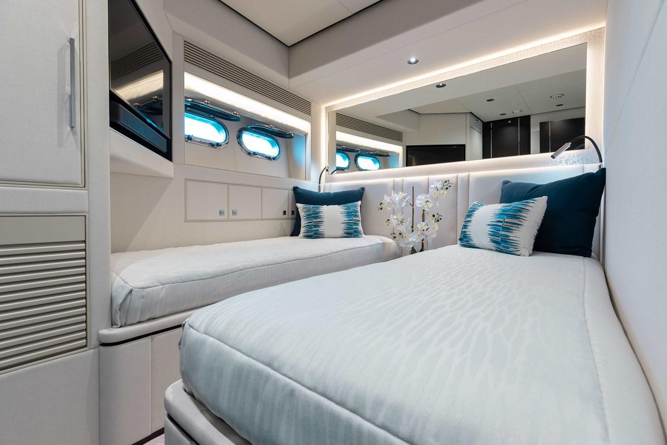 a room with two beds aboard E90 MOTOR Yacht for Sale