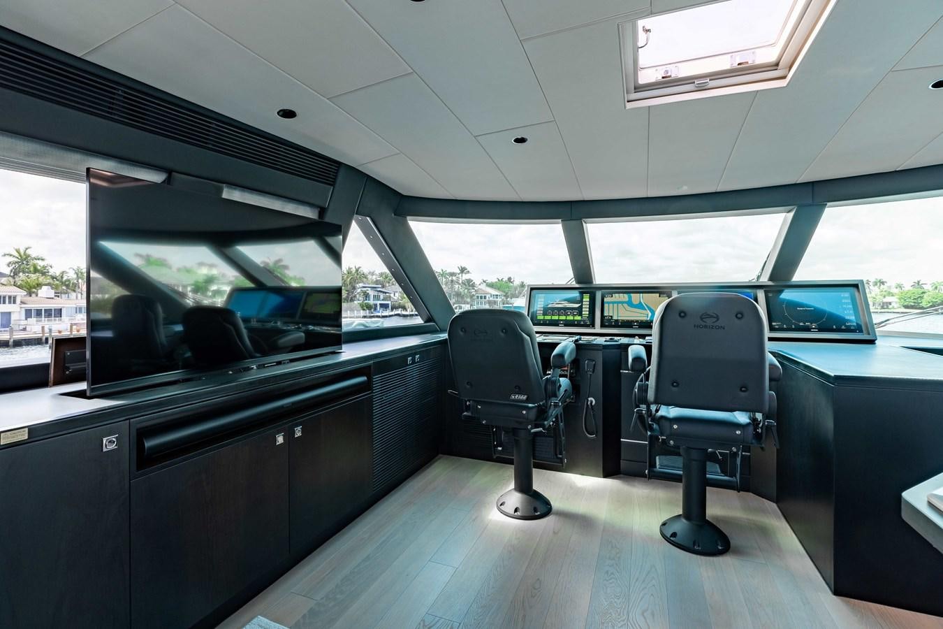 a room with a chair and a desk and a chair aboard E90 MOTOR Yacht for Sale