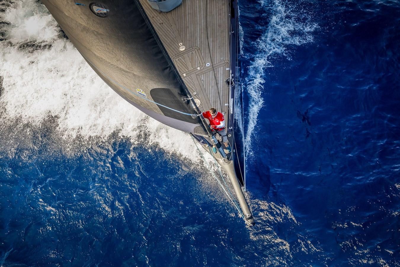 a person standing on a boat aboard GUARDIAN ANGEL Yacht for Sale