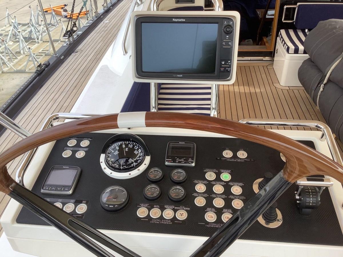 a radio on a table aboard GUARDIAN ANGEL Yacht for Sale