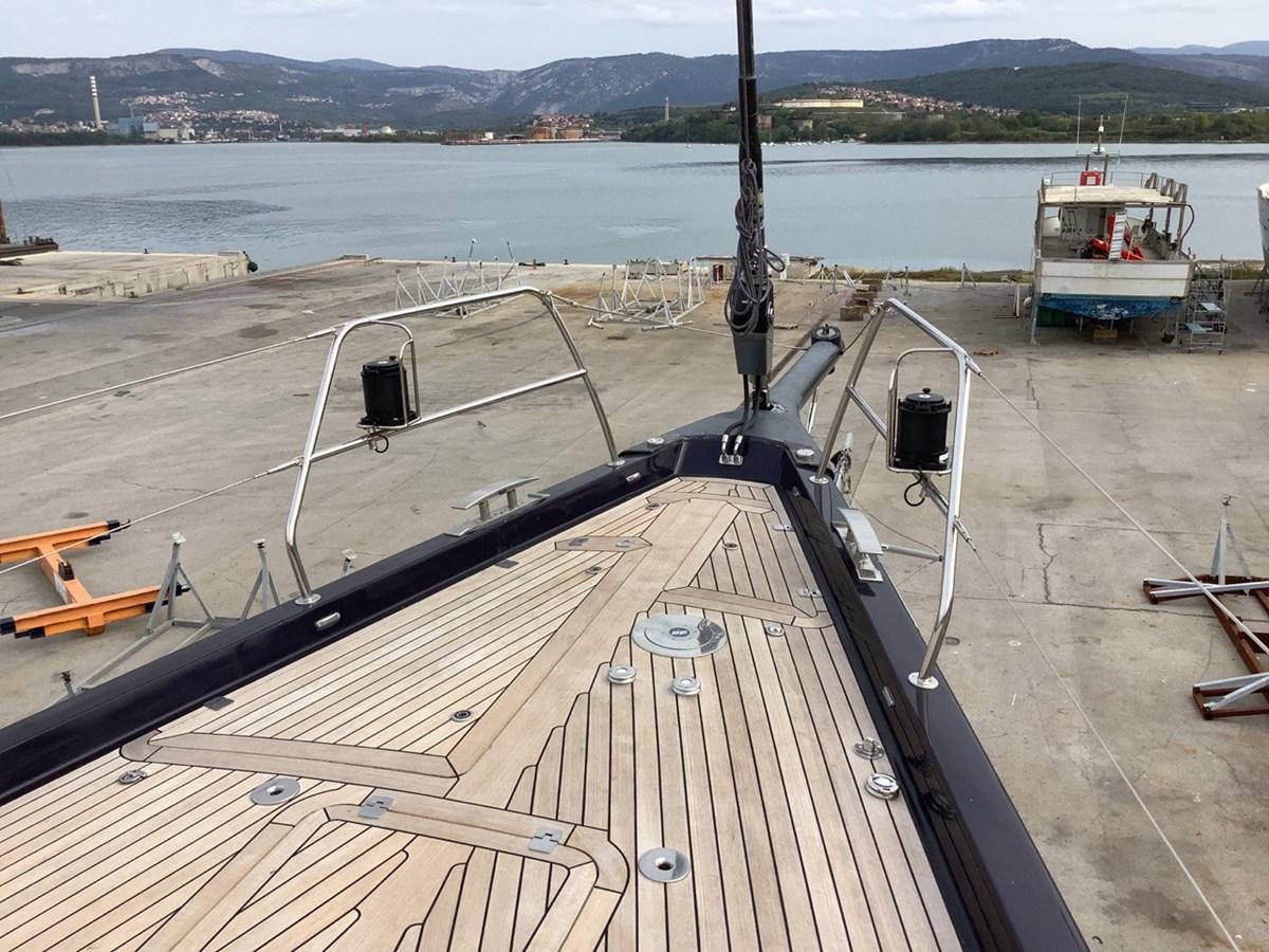 a large ship on a dock aboard GUARDIAN ANGEL Yacht for Sale