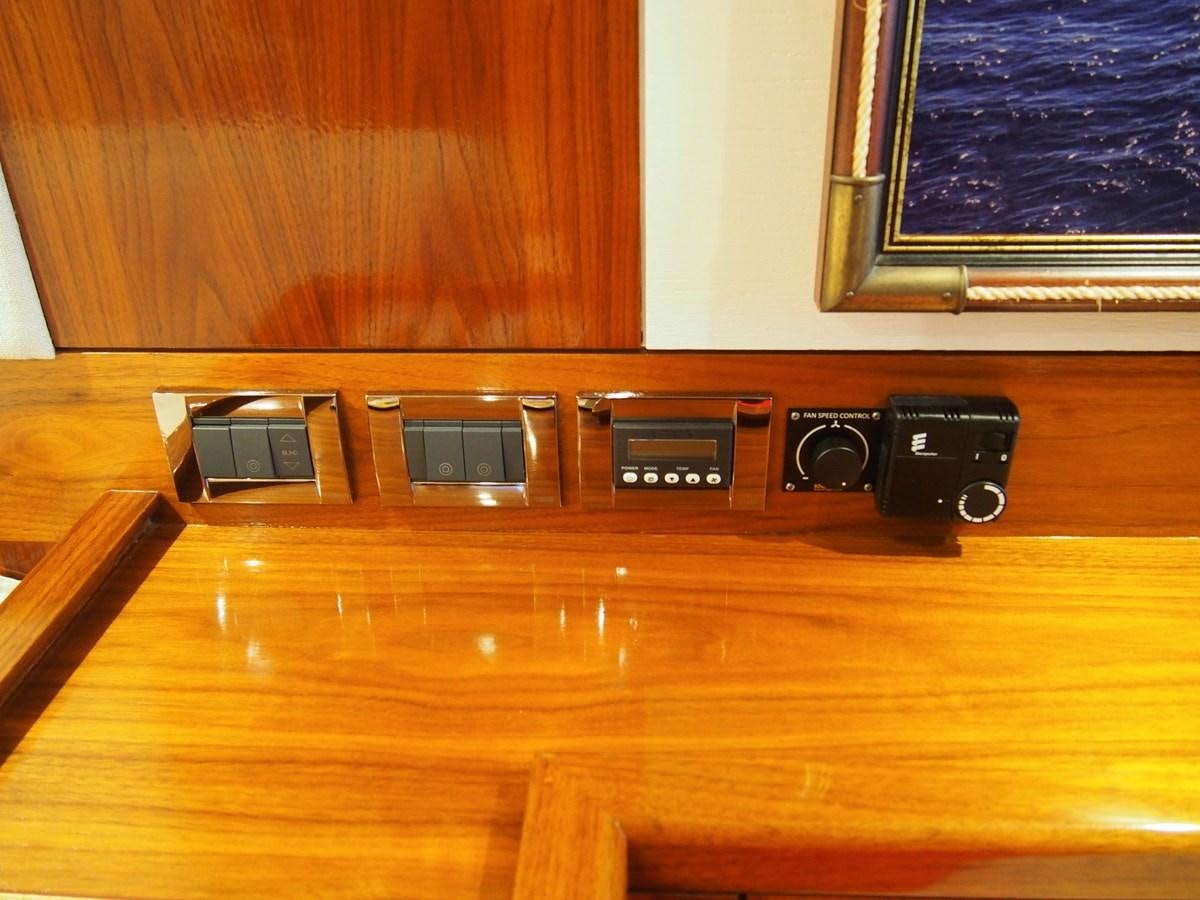 a wooden object with a couple of black knobs on it aboard GUARDIAN ANGEL Yacht for Sale