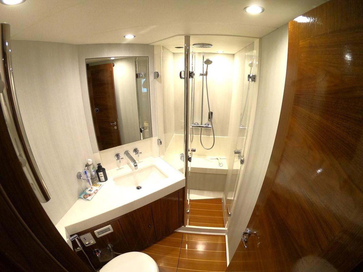 a bathroom with a standup shower aboard GUARDIAN ANGEL Yacht for Sale