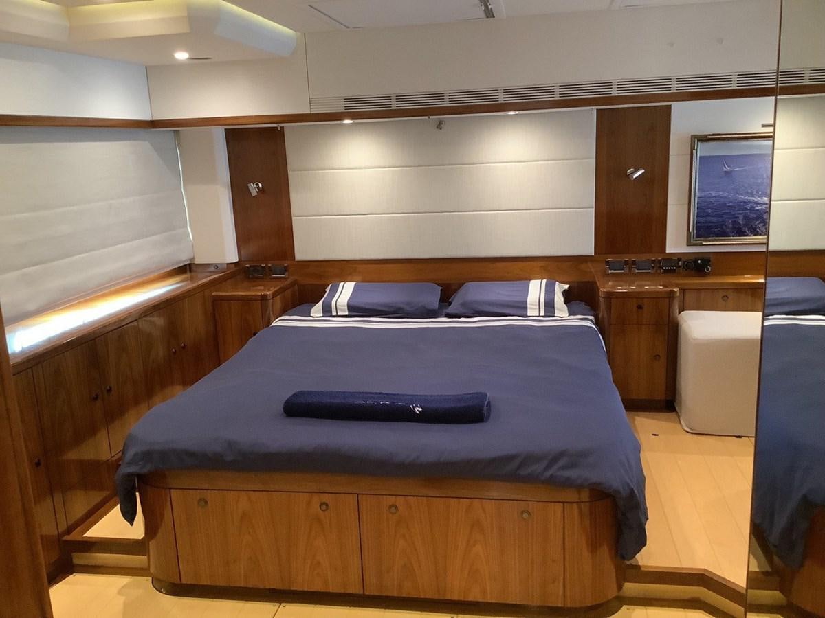 a bed in a room aboard GUARDIAN ANGEL Yacht for Sale