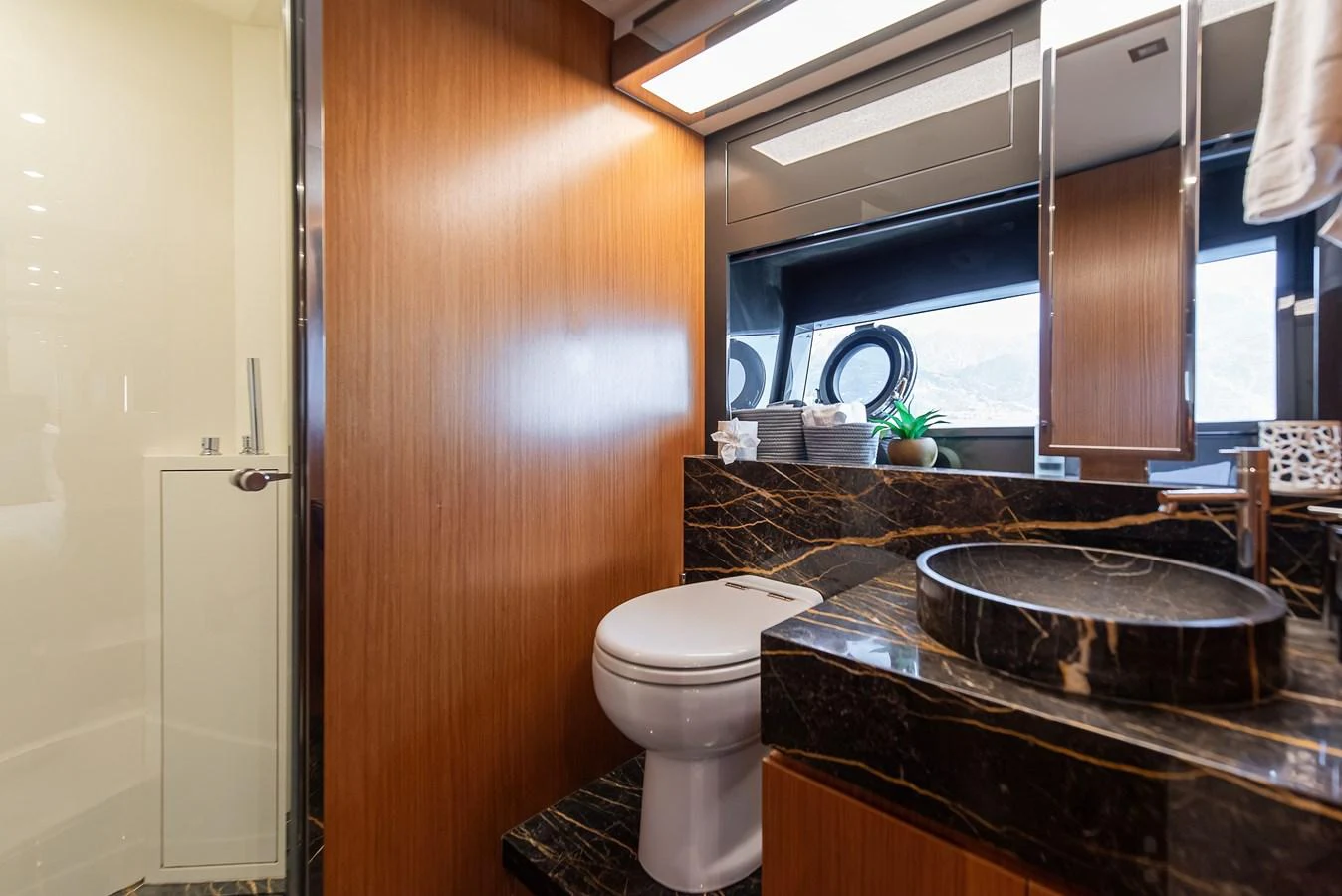 a bathroom with a sink and a toilet aboard SOUL Yacht for Sale