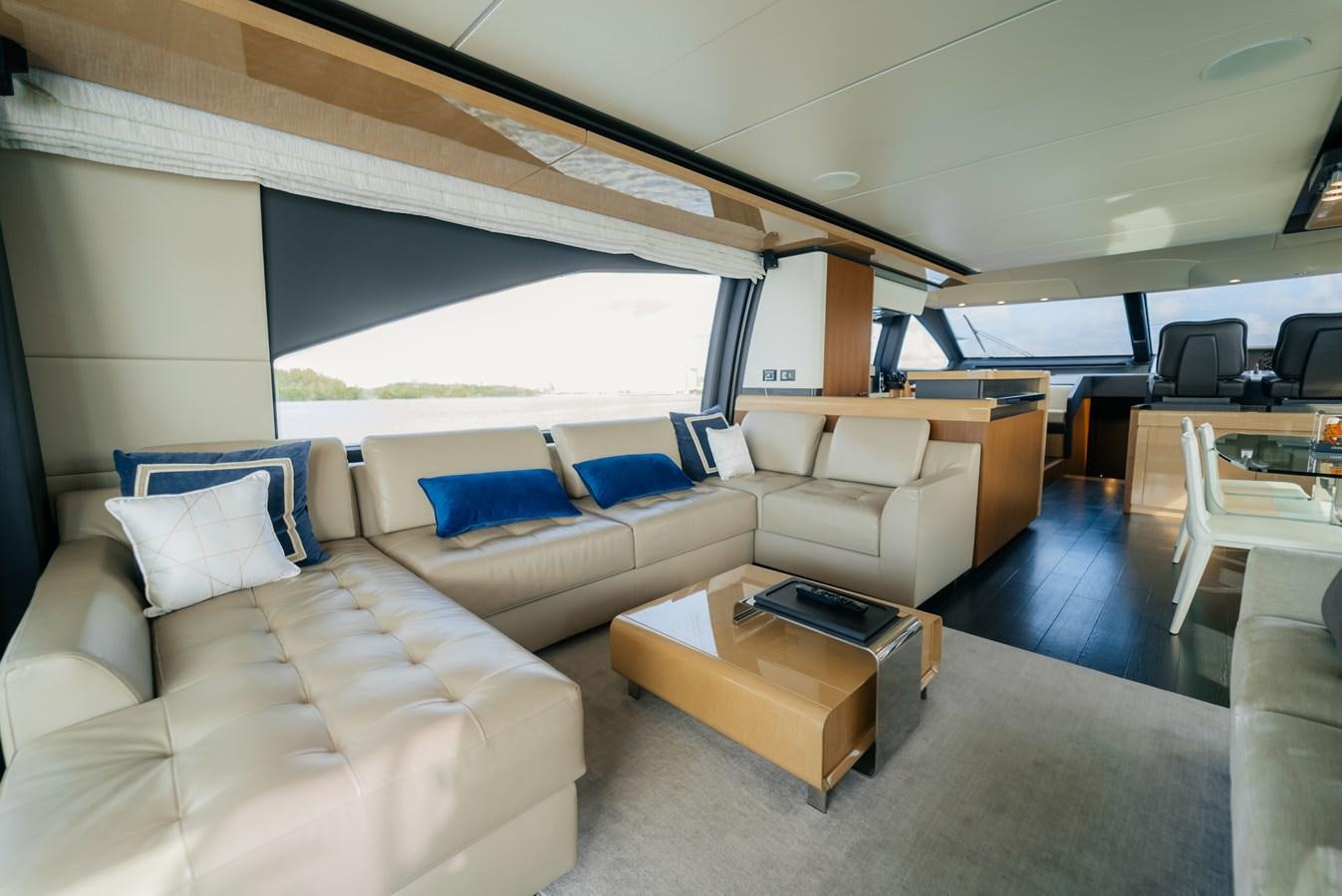 a living room with a large window aboard VENTURE Yacht for Sale