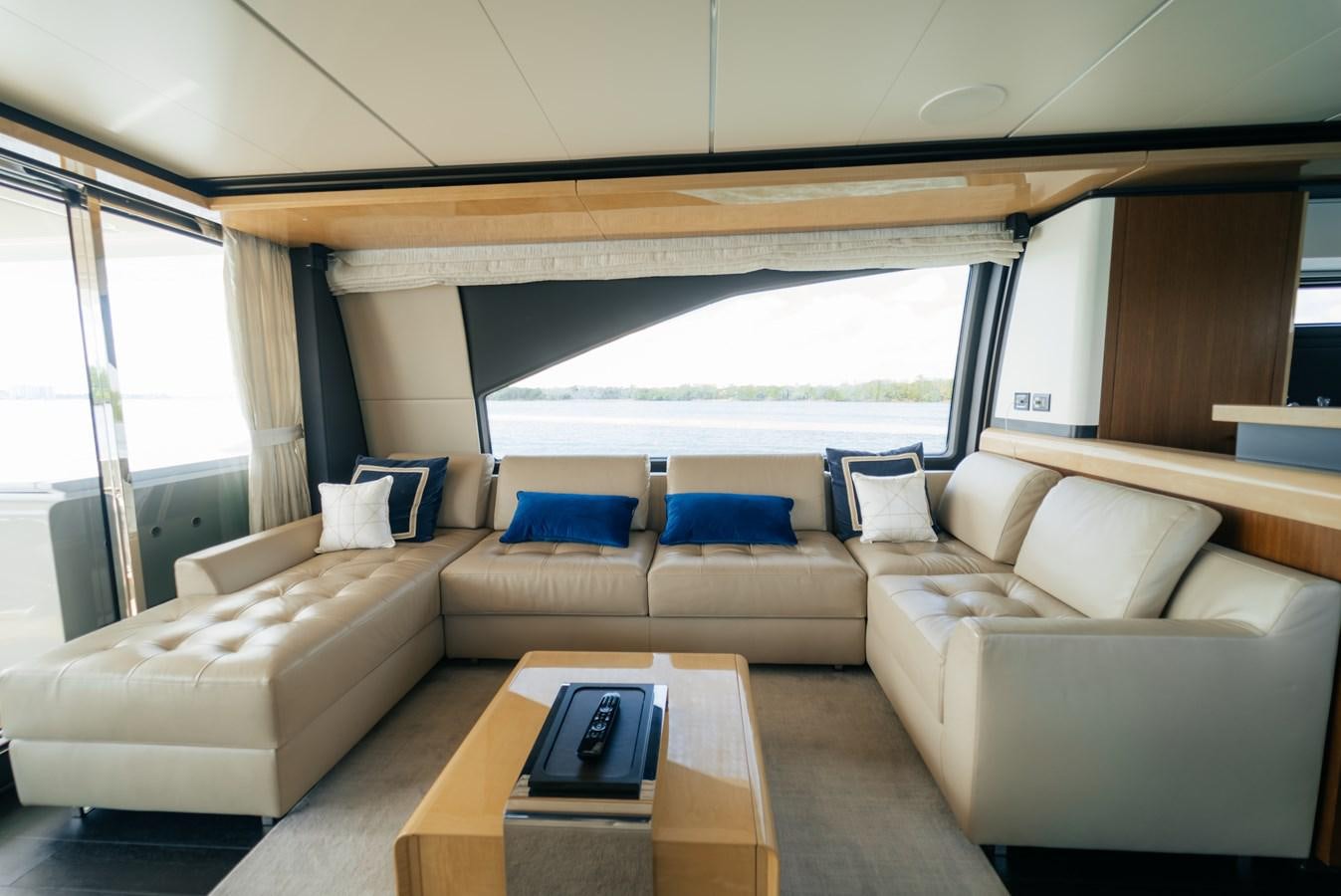 a living room with a large window aboard VENTURE Yacht for Sale