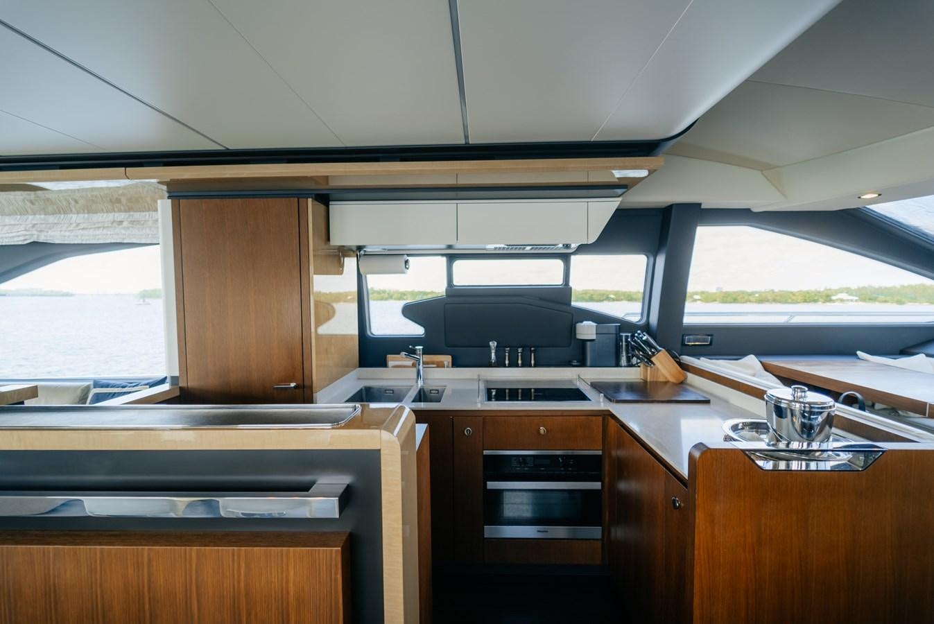 a kitchen with a window aboard VENTURE Yacht for Sale
