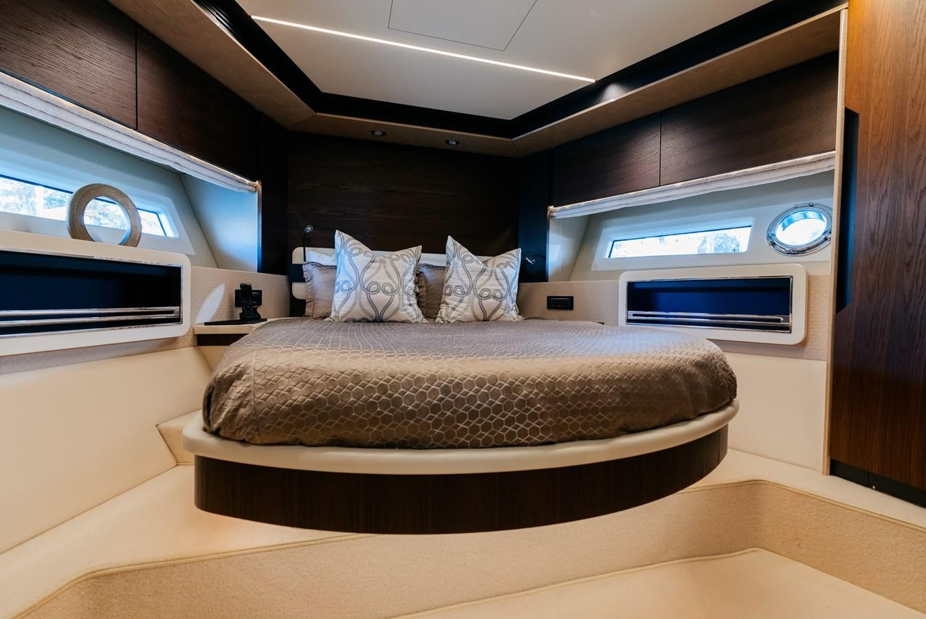 a bed in a room aboard VENTURE Yacht for Sale