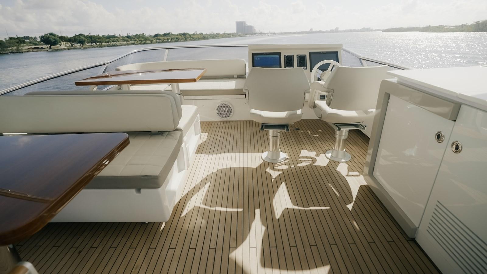 a boat on a deck aboard VENTURE Yacht for Sale