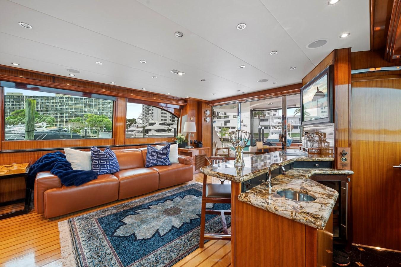 a living room with a large open window aboard ENDLESS SUMMER Yacht for Sale