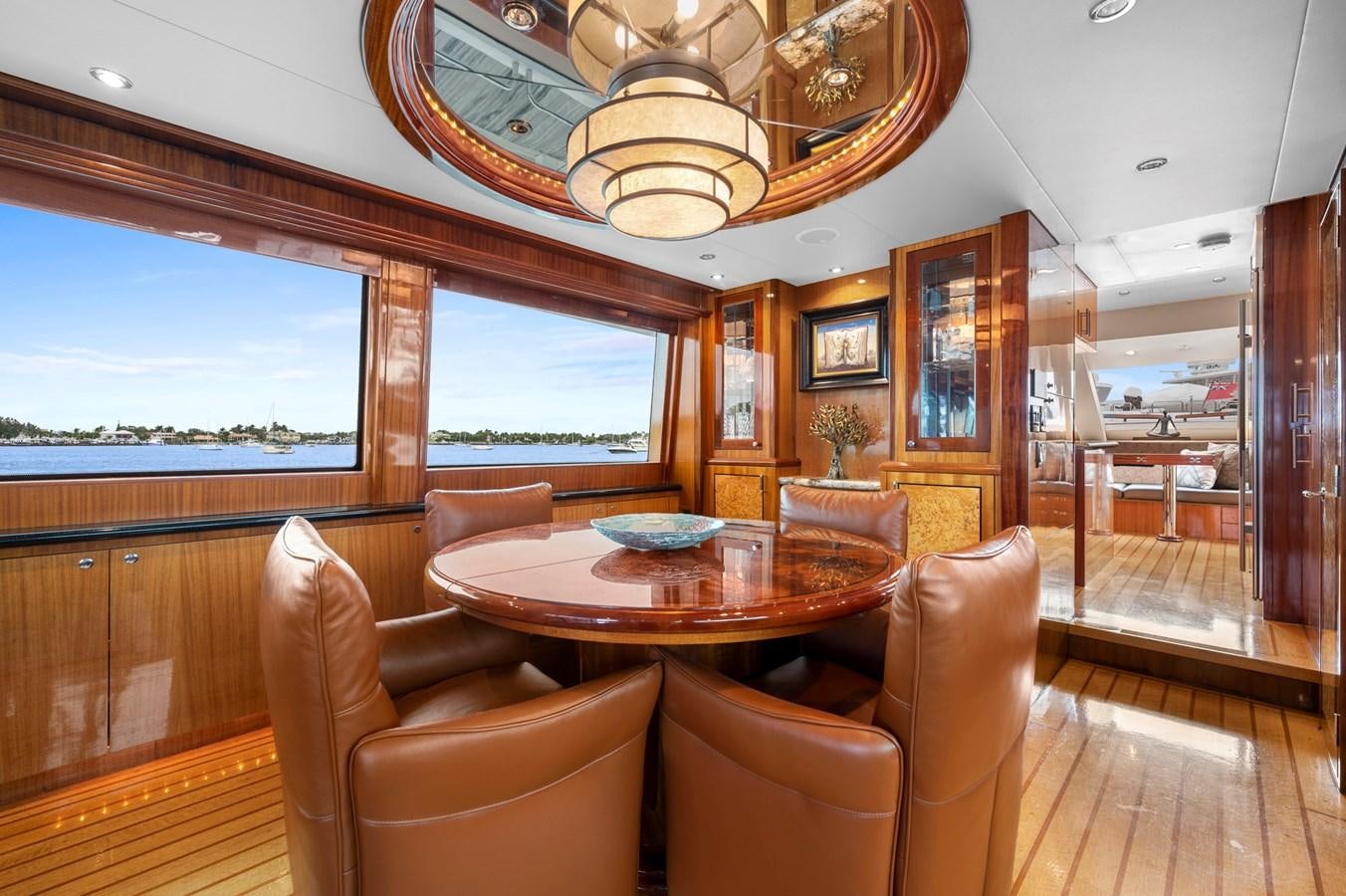 a room with a table and chairs aboard ENDLESS SUMMER Yacht for Sale