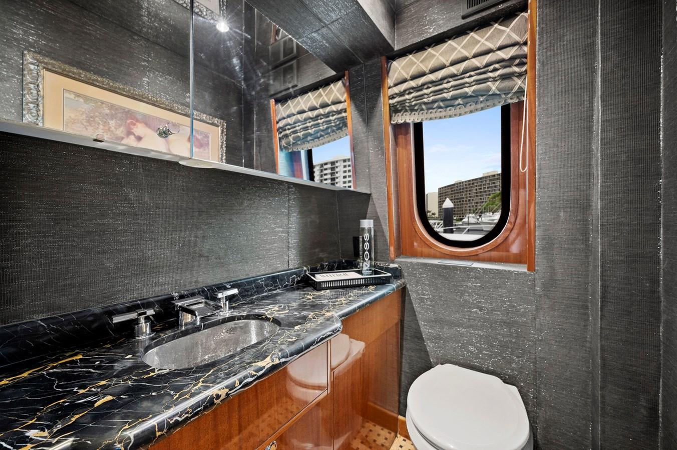 a bathroom with a sink and a toilet aboard ENDLESS SUMMER Yacht for Sale