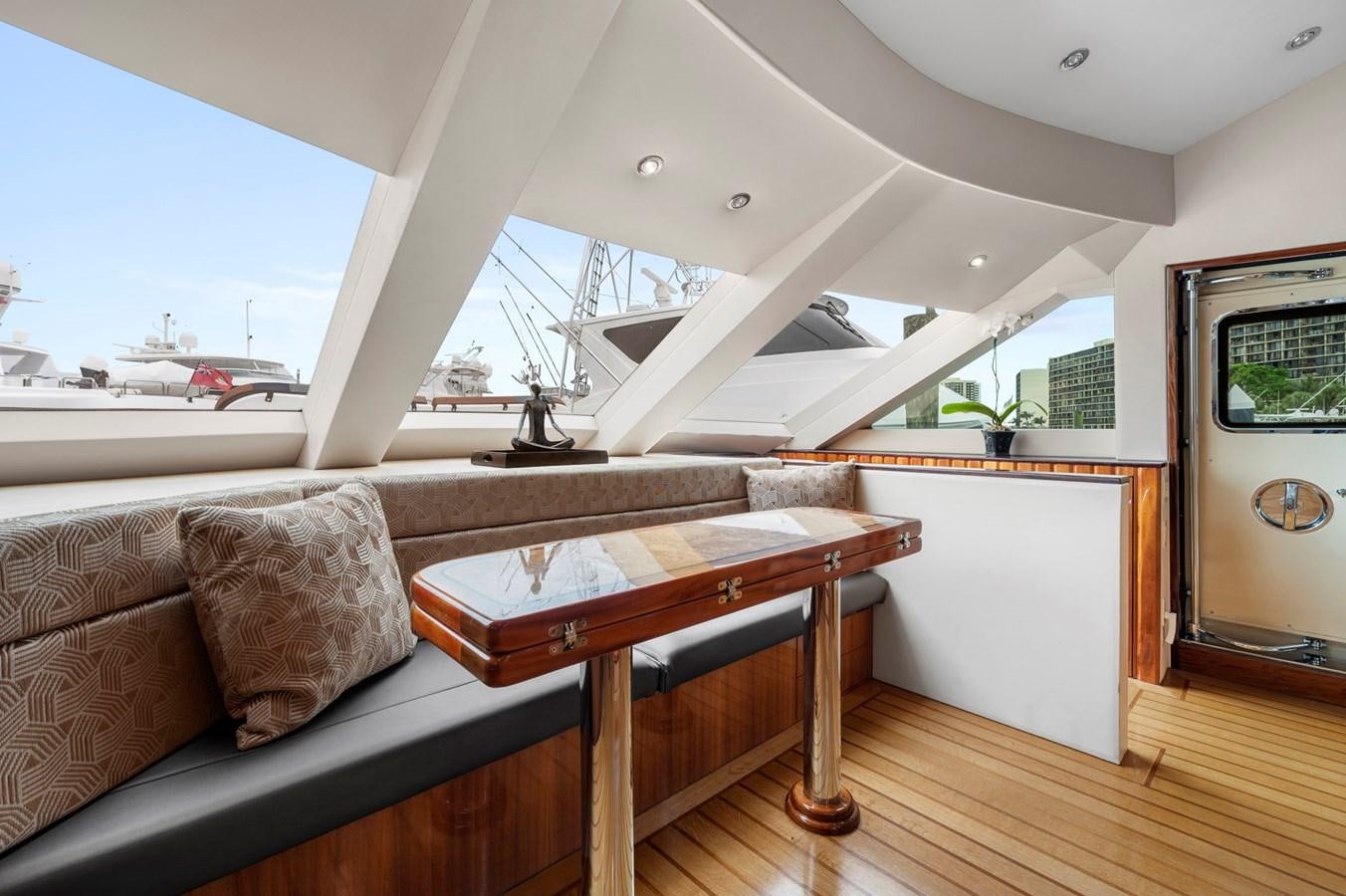 a room with a couch and a table aboard ENDLESS SUMMER Yacht for Sale