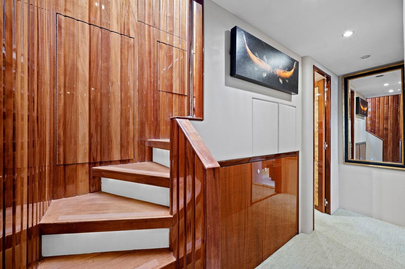 a wood staircase in a room aboard ENDLESS SUMMER Yacht for Sale