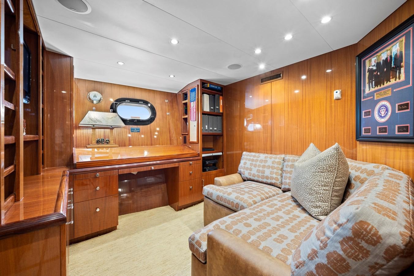 a living room with a couch and a tv aboard ENDLESS SUMMER Yacht for Sale
