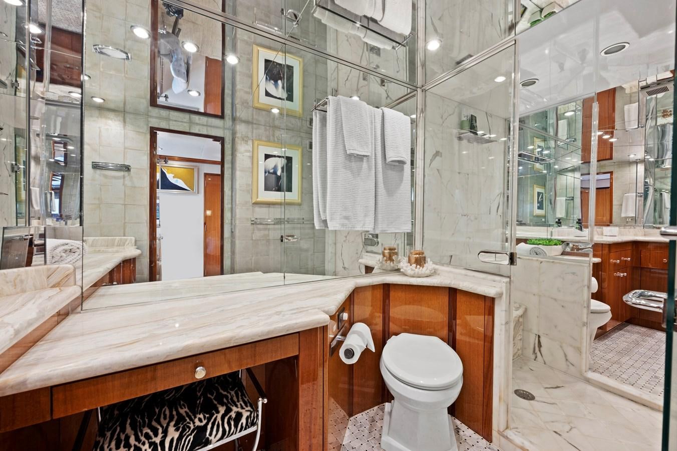 a bathroom with a large mirror aboard ENDLESS SUMMER Yacht for Sale