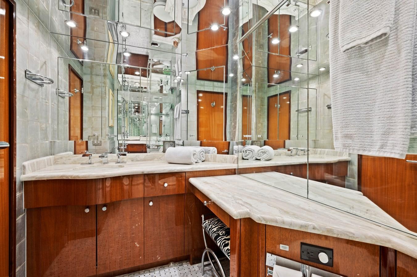 a bathroom with a large mirror aboard ENDLESS SUMMER Yacht for Sale