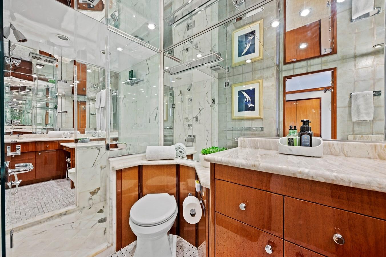 a bathroom with a large mirror aboard ENDLESS SUMMER Yacht for Sale