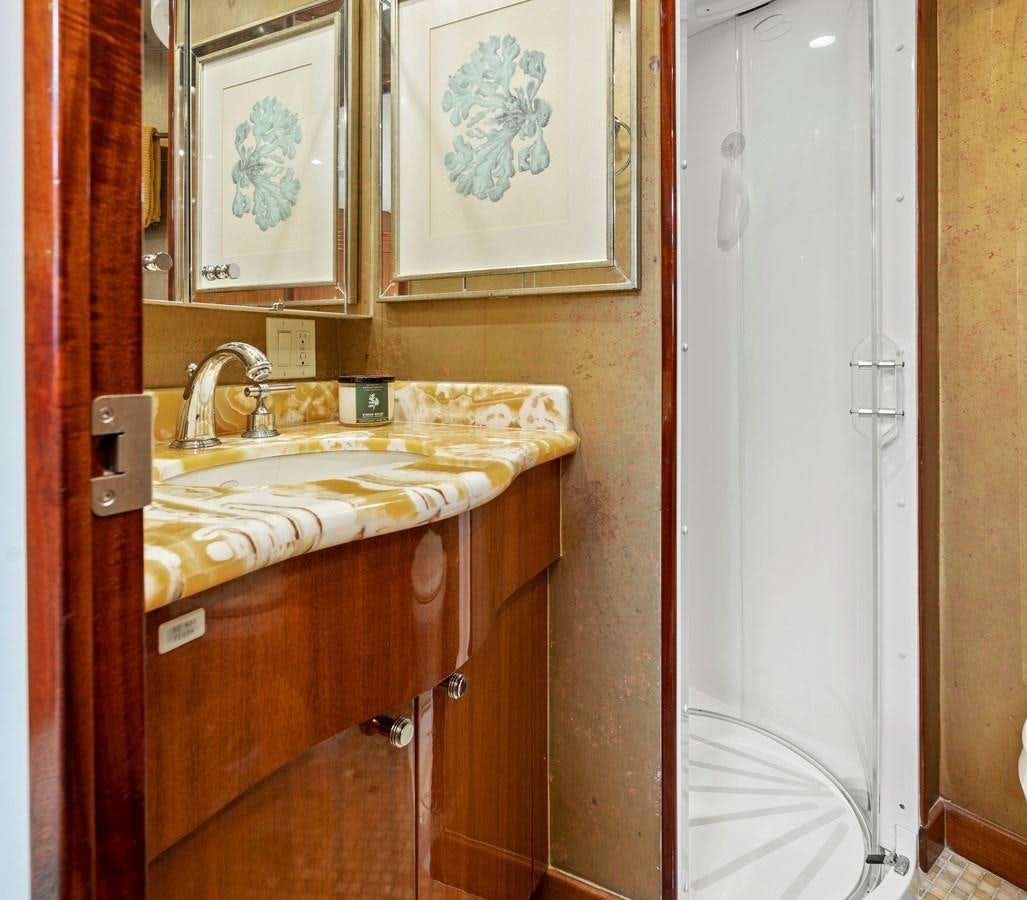 a bathroom with a sink and a mirror aboard ENDLESS SUMMER Yacht for Sale