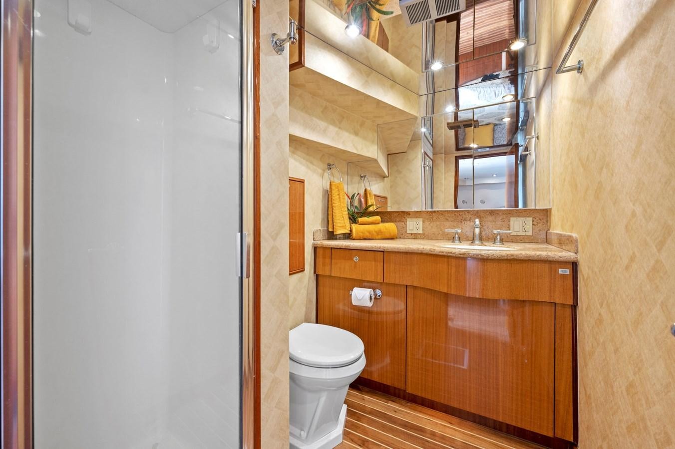 a bathroom with a toilet and sink aboard ENDLESS SUMMER Yacht for Sale