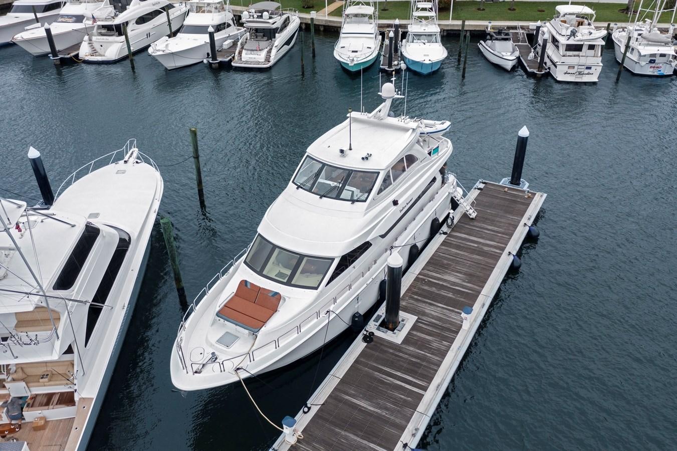 a boat docked at a pier aboard ENDLESS SUMMER Yacht for Sale