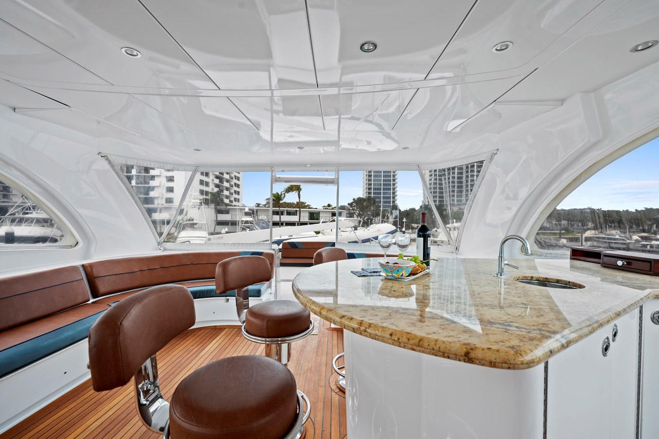 a room with a table and chairs aboard ENDLESS SUMMER Yacht for Sale