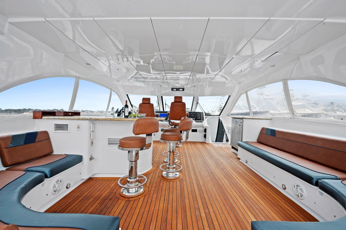 a room with a table and chairs aboard ENDLESS SUMMER Yacht for Sale