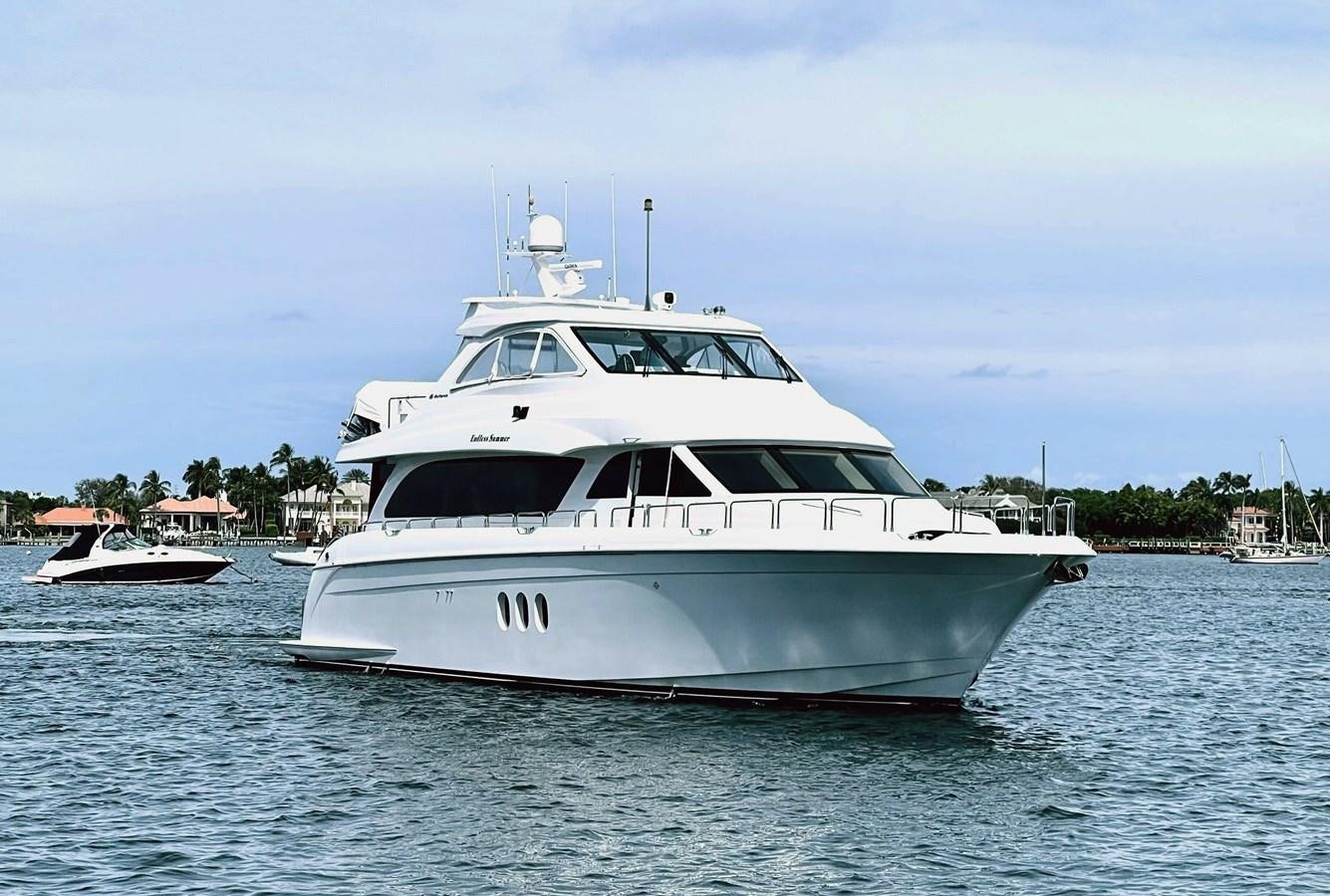 a white boat on the water aboard ENDLESS SUMMER Yacht for Sale