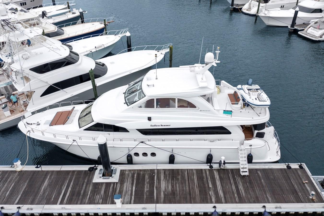 a boat docked at a pier aboard ENDLESS SUMMER Yacht for Sale