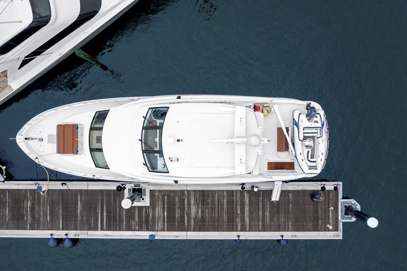 a white helicopter on a runway aboard ENDLESS SUMMER Yacht for Sale