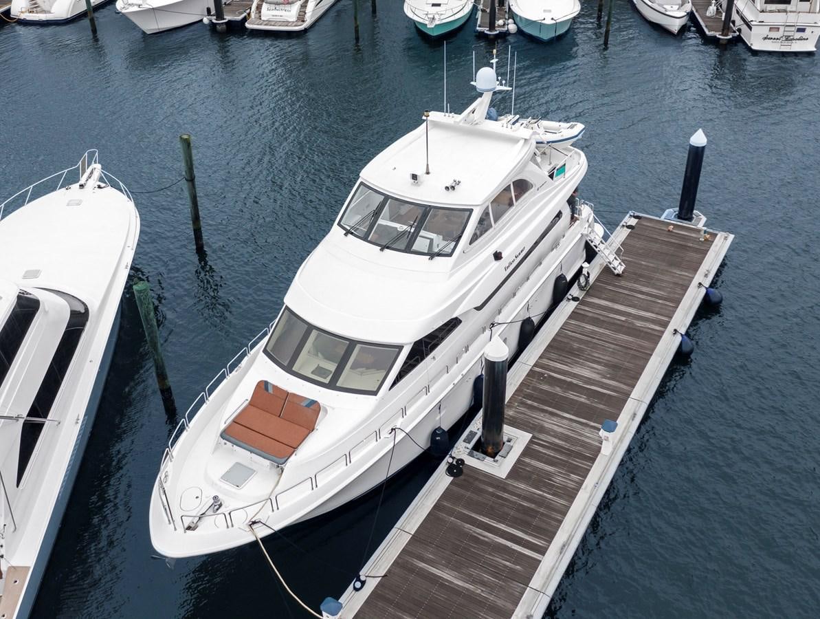 a boat docked at a pier aboard ENDLESS SUMMER Yacht for Sale