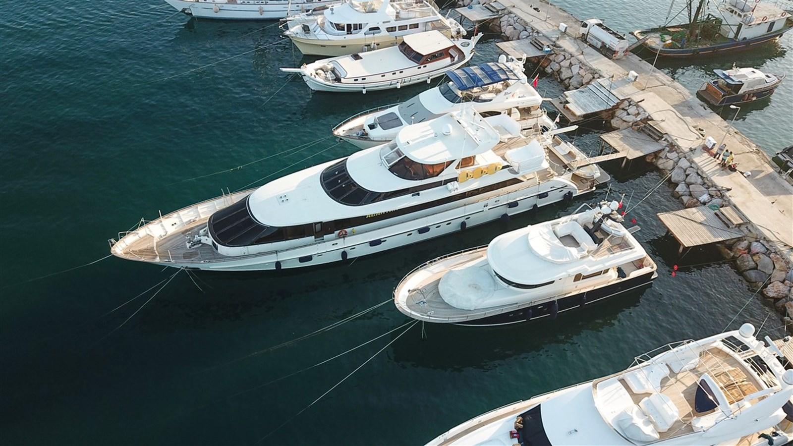 a group of boats on a dock aboard AGARTHA Yacht for Sale