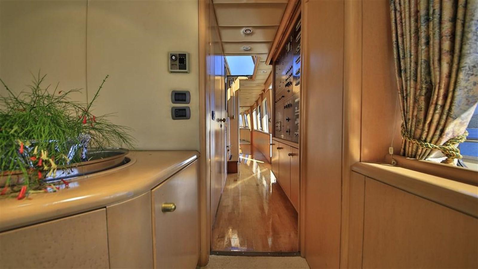 a kitchen with a sink and cabinets aboard AGARTHA Yacht for Sale