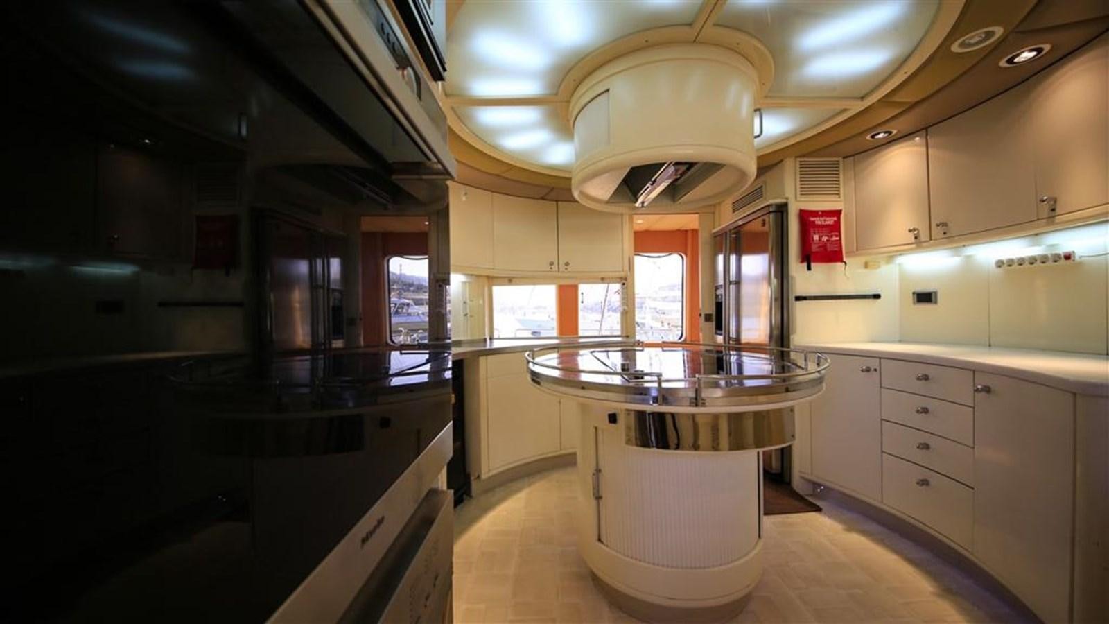 a kitchen with a large island aboard AGARTHA Yacht for Sale
