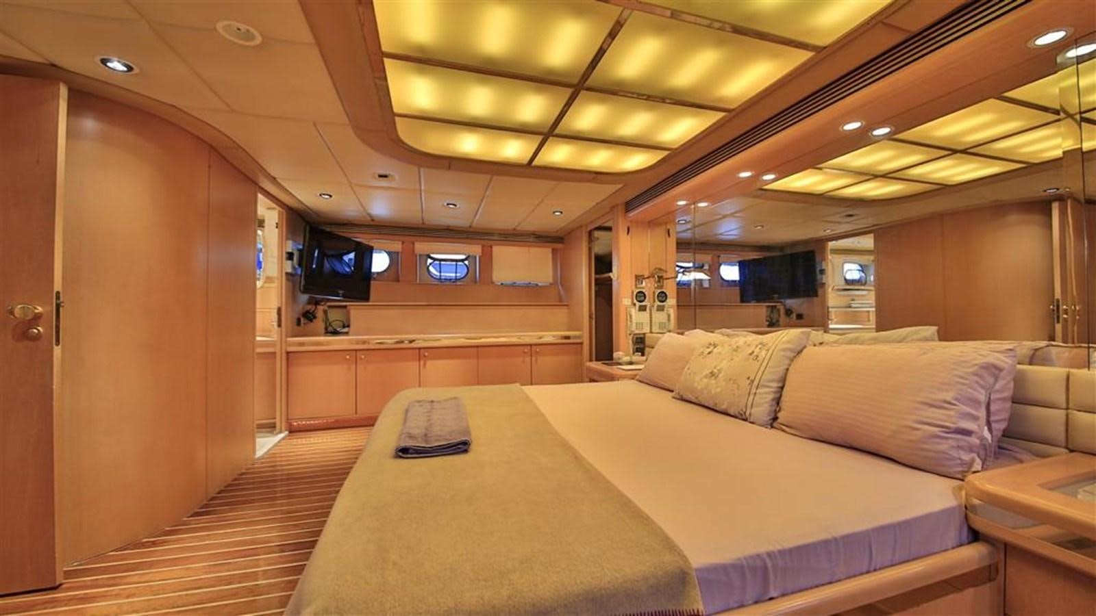 a bed in a room aboard AGARTHA Yacht for Sale