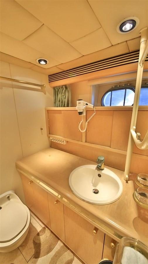 a bathroom with a sink and a toilet aboard AGARTHA Yacht for Sale